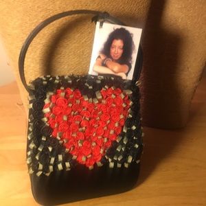 Original handmade heart clutch roses